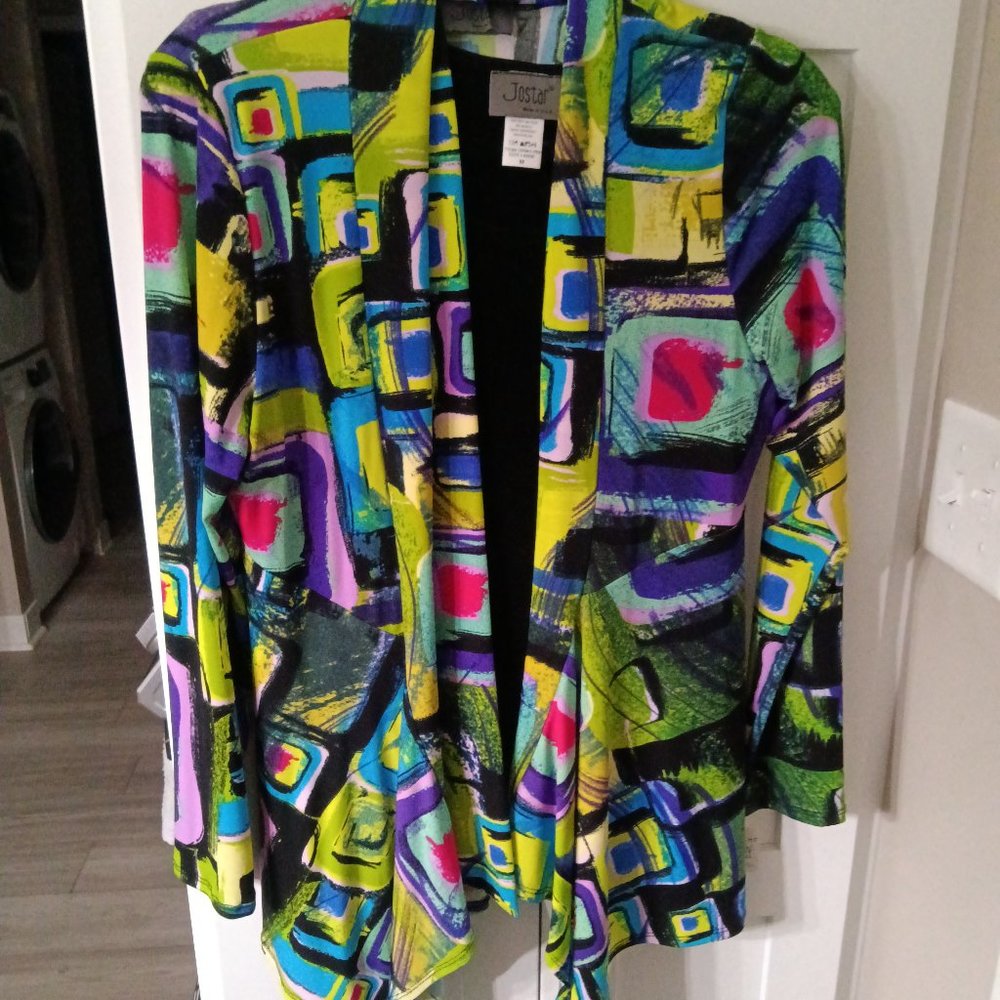 This is a new open draped front cardigan covered in a bright geometric print